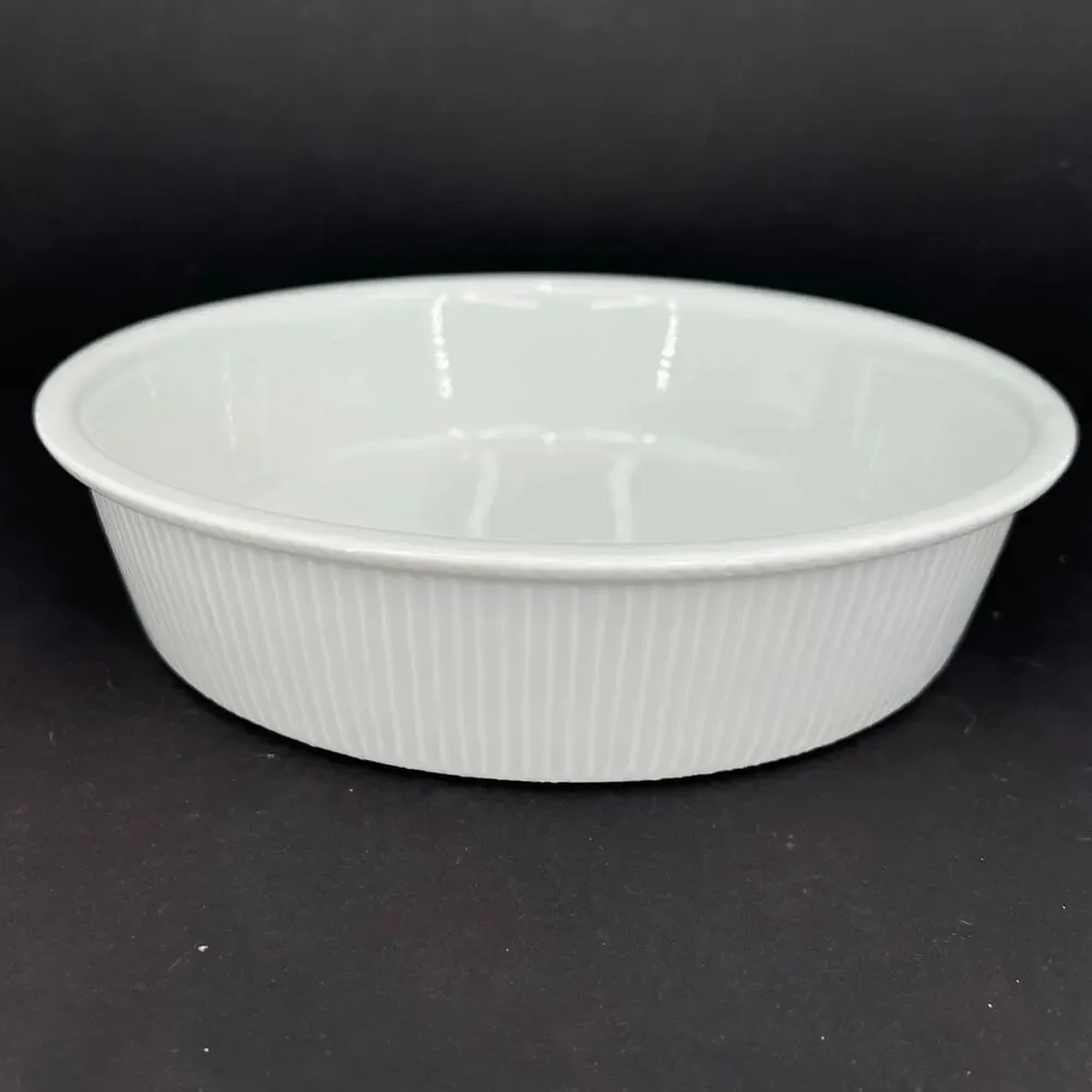 Pillivuyt white ceramic pie quiche baking dish fluted exterior ribbing.
